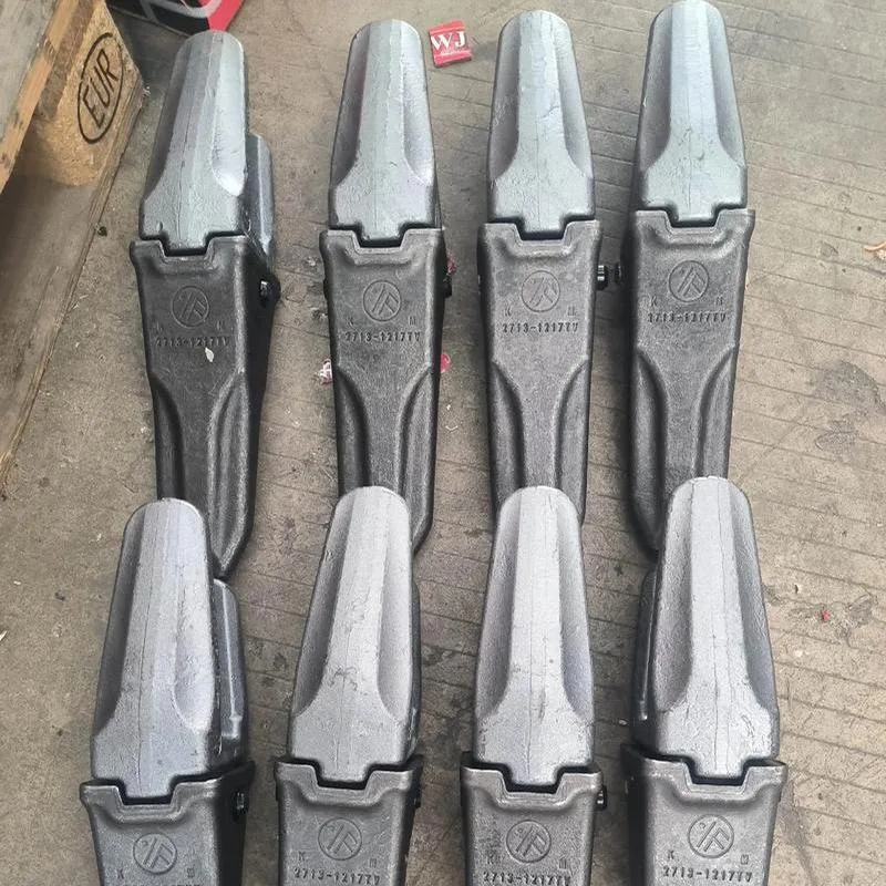 Gravemaskin bøtte tenner